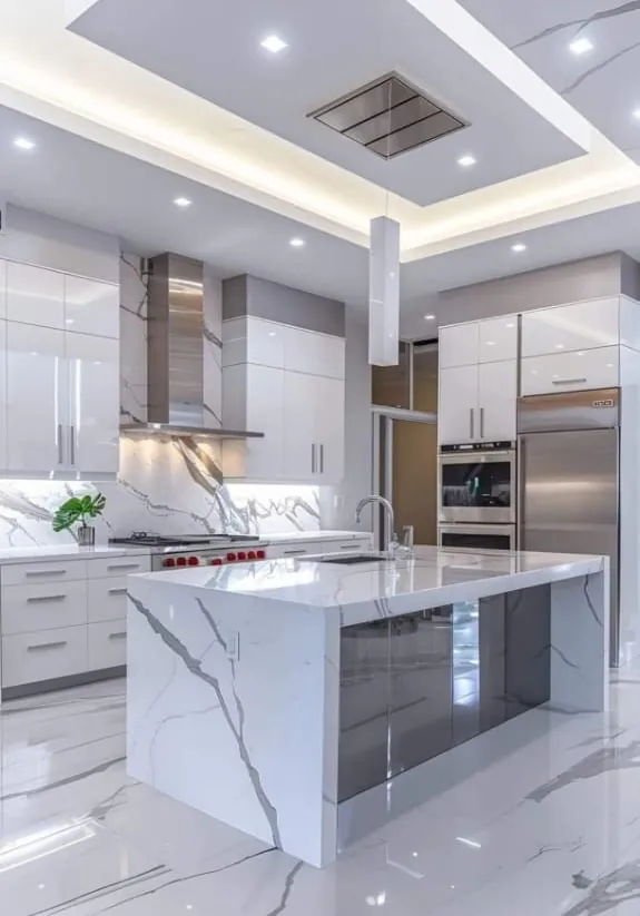 Ilha de cozinha em mármore branco com veios acinzentados